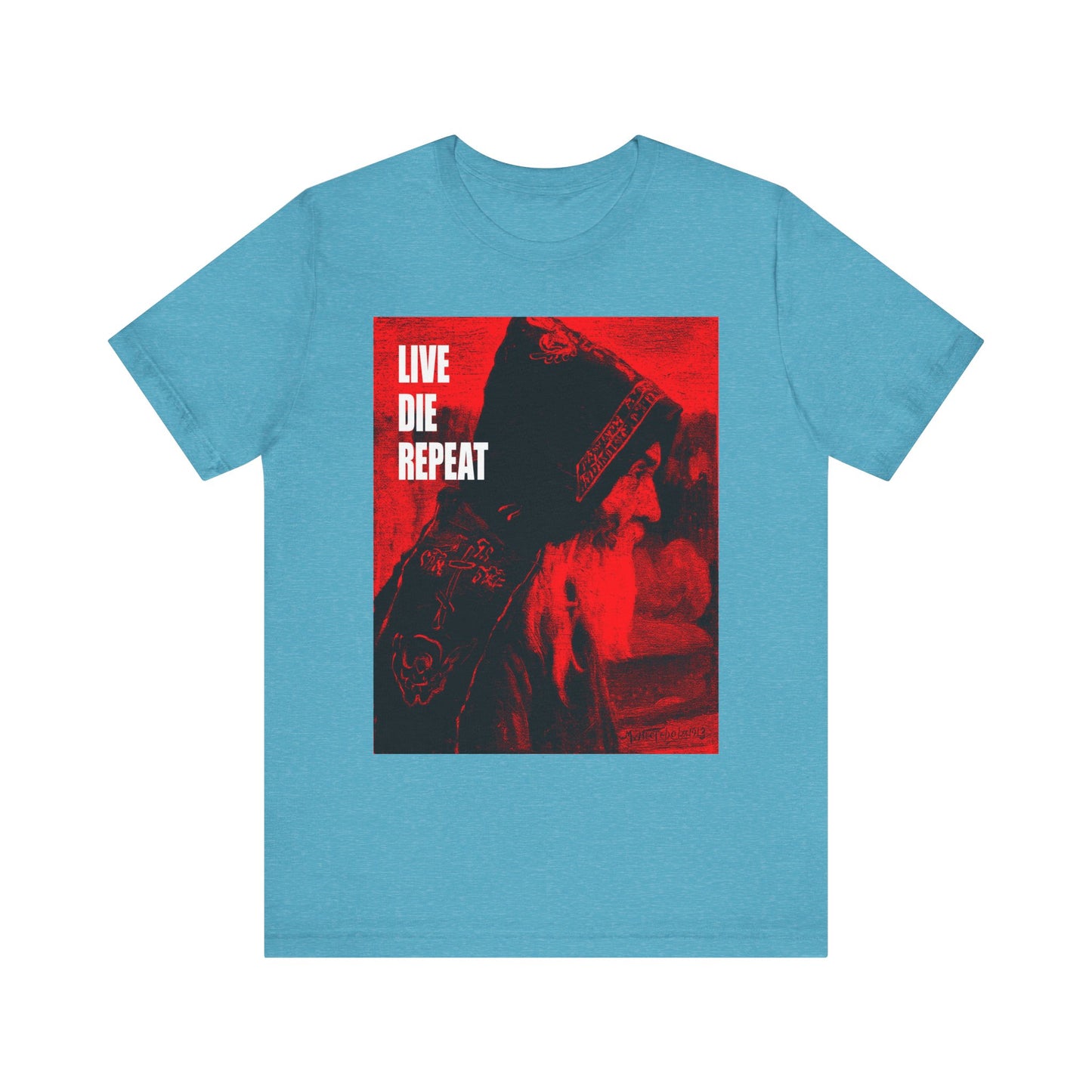 Heather Aqua unisex tee with Orthodox monk art by Mikhail Nesterov; features "LIVE DIE REPEAT" text and a hooded figure, inspired by the motto: "Die Every Day, You Will Live Forever." Lightweight cotton for comfort.