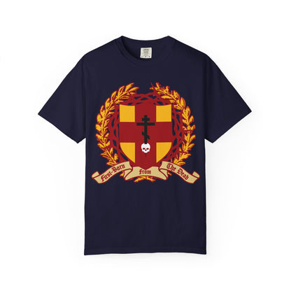 True Navy “First-Born from the Dead (Col 1:18)” heavyweight cotton unisex t-shirt features a heraldic shield with an Orthodox cross piercing a skull, adorned with red and gold crest details, a laurel wreath, crown of thorns, and a First-Born from the Dead banner—symbolizing redemption through His blood and alluding to the Exodus Bible verse about Egypt’s firstborns.