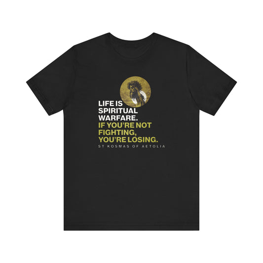 Black "Life is Spiritual Warfare" tee featuring St Kosmas of Aetolia, inspired by Gustave Dore’s David & Goliath and Unseen Warfare. Orthodox lightweight cotton unisex shirt.