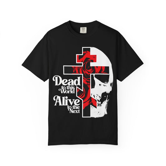 Black “Dead to this World” heavyweight unisex t-shirt features a skull, cross, and red rose in Christian goth style with 70s typography—a bestselling design inspired by Renunciation of the World and the Ladder of Divine Ascent.