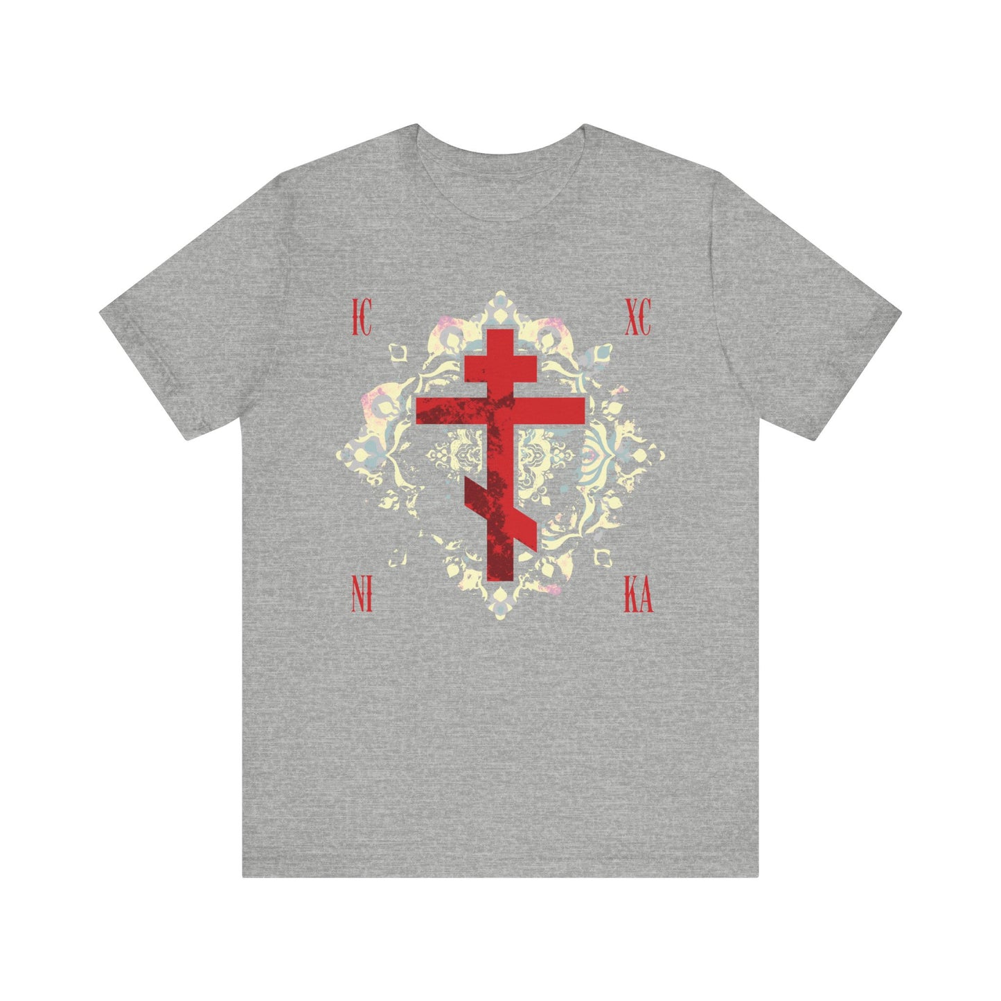 Athletic Heather unisex tee featuring a textured red Orthodox cross with a medieval floral background and "ICXC NIKA"—a symbol of Jesus Christ’s victory—designed with inspiration from the faith of St John of Kronstadt.