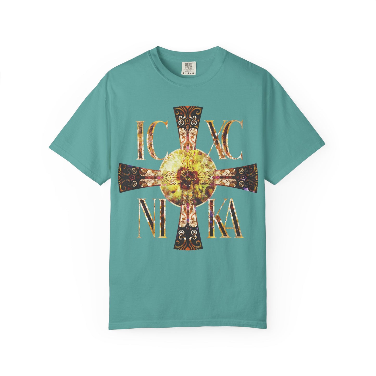 Seafoam heavyweight unisex tee featuring a Celtic-style equal-armed Cross with a bright solar texture and the letters IC XC NI KA—a luminous Orthodox tribute in premium cotton.