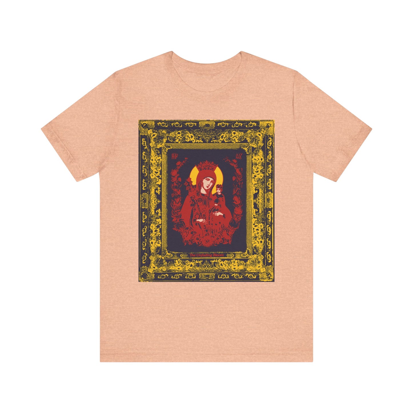 Introducing the Unfading Bloom Ornate Theotokos Iconographic tee: a lightweight cotton unisex shirt in heather peach, featuring a crowned, stylized image of Mary, the Mother of God, in rich red tones—framed by ornate gold and black borders and adorned with Akathist-inspired floral motifs.