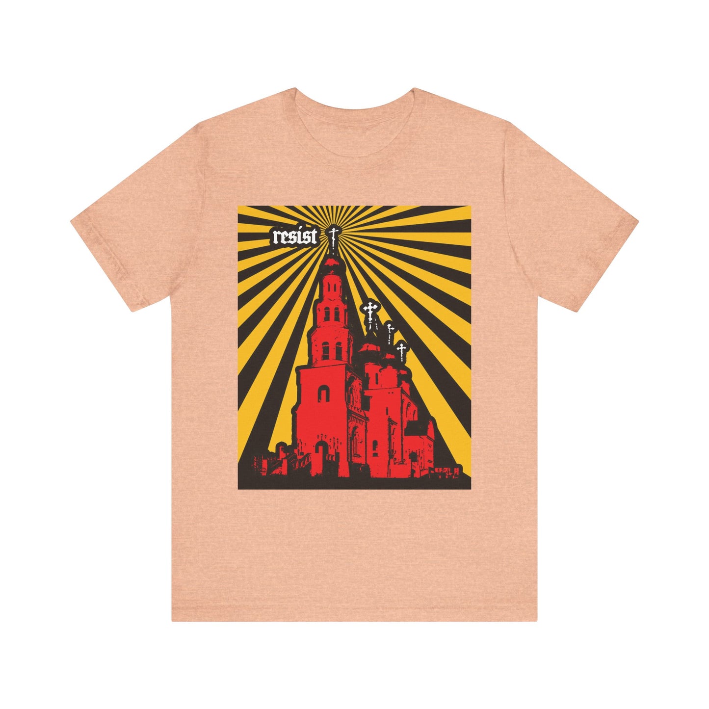 Wearing the “Resist (Orthodoxy Against the World)” lightweight unisex tee in Heather Peach, featuring a graphic of a red church, yellow and black rays, and the word “resist” at the top left—a subtle nod to St Ignatius Brianchaninov’s warnings against the spirit of the age and highlighting The Orthodox Church as a beacon for the world.