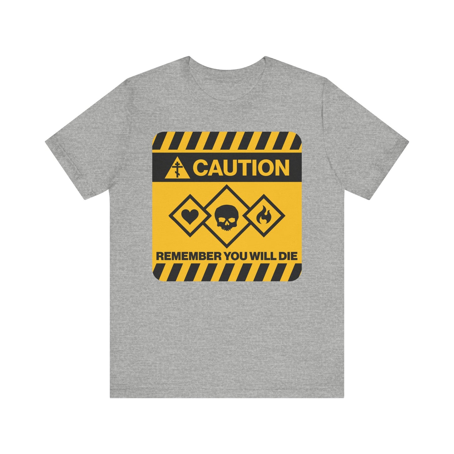 Athletic Heather t-shirt featuring a yellow caution street sign design with hazard icons and the text "Remember You Will Die"—a striking memento mori that draws on the wisdom of Orthodox Christian tradition, inspired by saints like St. Irenaeus of Lyons.