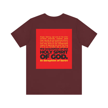 True Aim of Christian Life Unisex Tee: Lightweight maroon cotton shirt featuring St. Seraphim of Sarov’s quote on acquiring the Holy Spirit, with striking red and orange back text. Orthodox 2-sided IconoGraphic design.