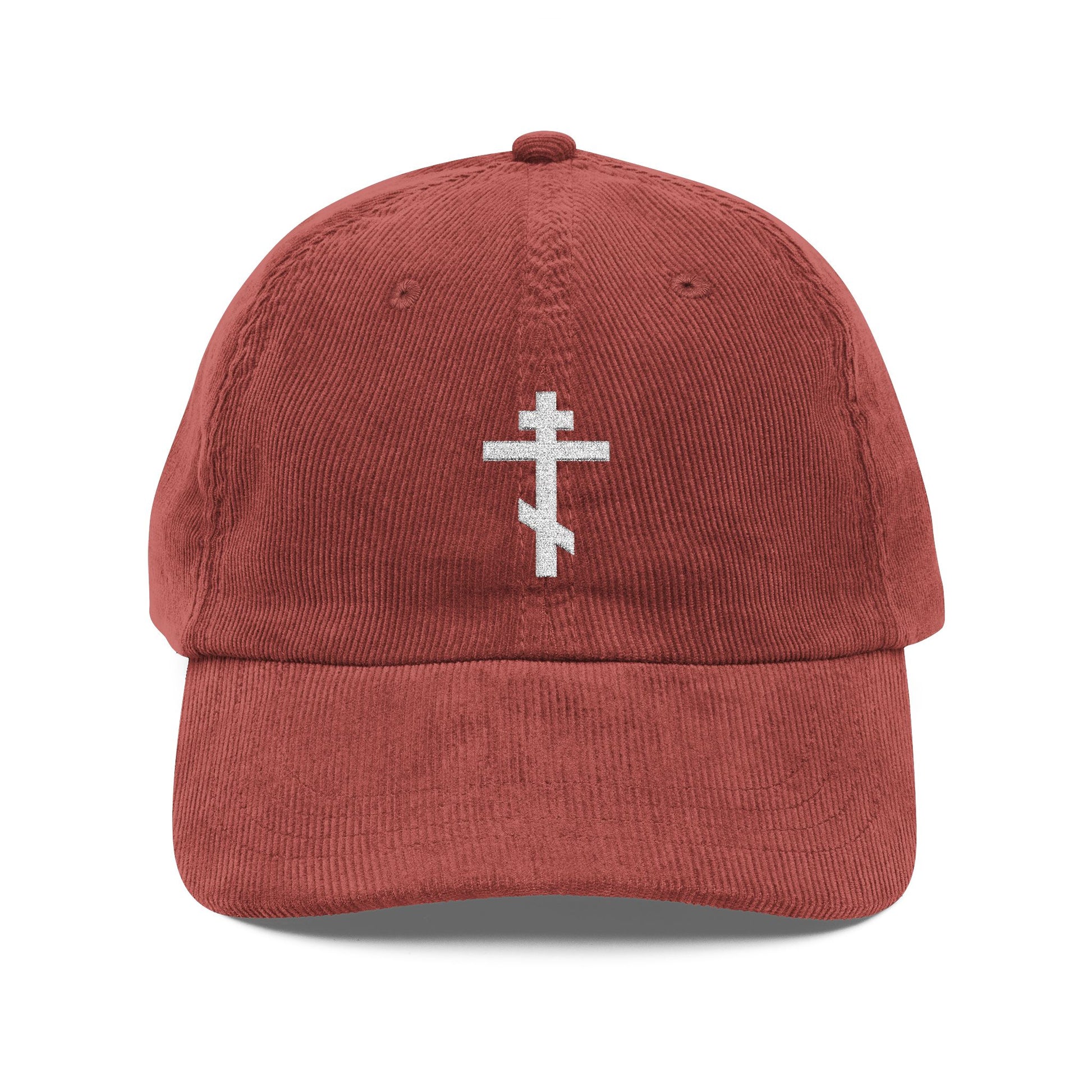 Rust-colored corduroy cap featuring the Simple White Orthodox TriBar Cross embroidered on the front—a subtle nod to faith and unseen spiritual warfare.