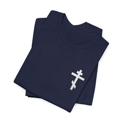 Small navy blue t-shirt featuring a white embroidered Orthodox cross and “May I Never Boast Except in the Cross of Our Lord Jesus Christ” (Gal 6:14) — perfect for Christian meditation.
