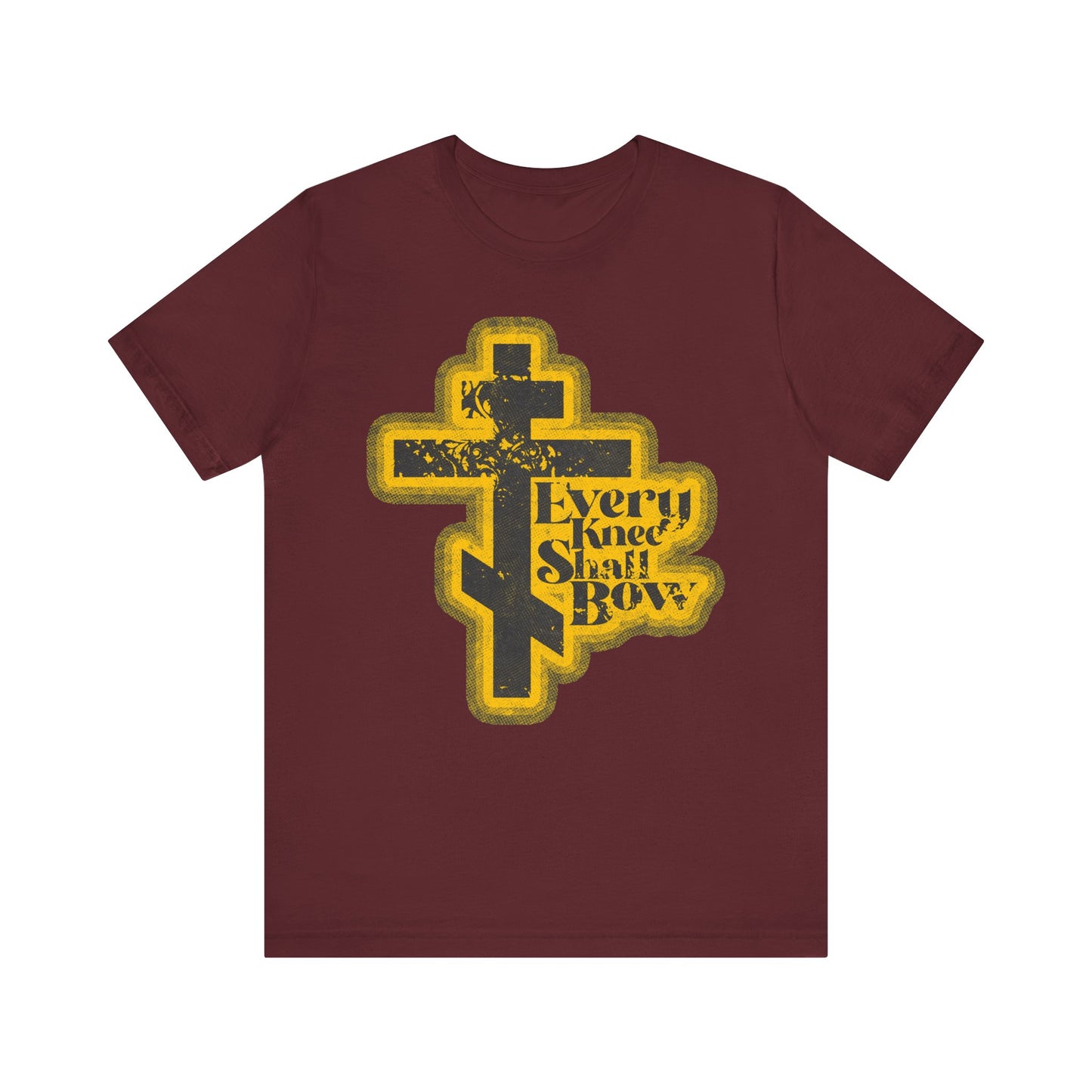 Maroon lightweight cotton unisex tee featuring a yellow distressed cross and "Every Knee Shall Bow," inspired by Philippians 2:10-11 & Isaiah 45:23 in a 70s comic book halftone style.