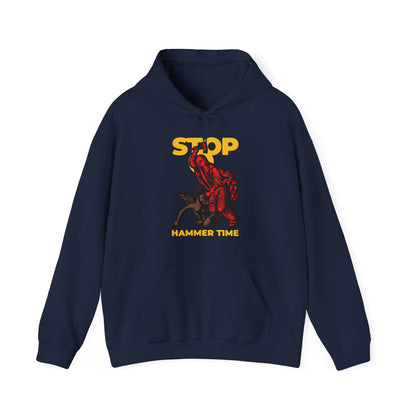 Navy hoodie featuring St Marina of Antioch beating the devil with a hammer, "Stop, Hammer Time," in red, blue, and yellow—a modern Orthodox meme for bold Christian style.