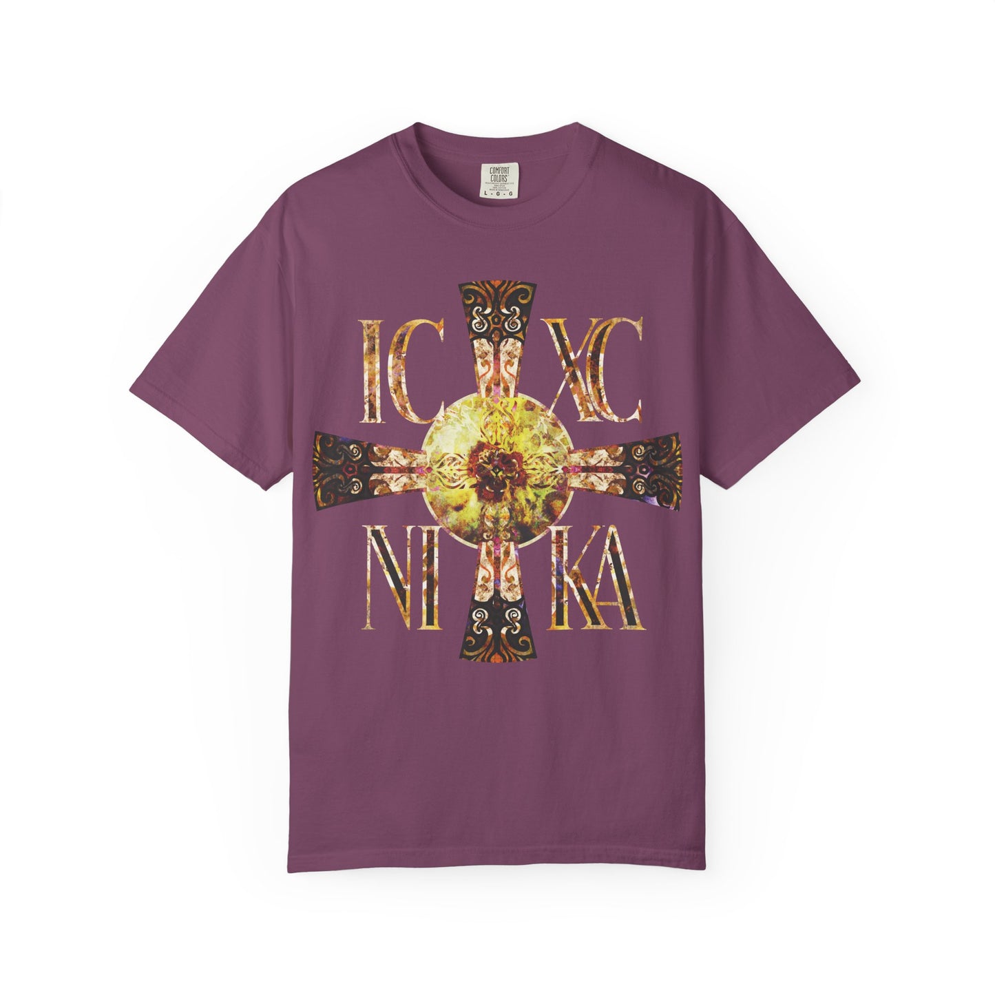 Berry-colored unisex heavyweight cotton tee featuring a Celtic-style, equal-armed cross in gold and black with ornate designs and the Greek letters IC XC NIKA on the front. Inspired by traditional Orthodox iconography, this design incorporates a bright solar texture—evoking the never-setting Sun to symbolize Christ’s victory, eternal light, and divine presence.
