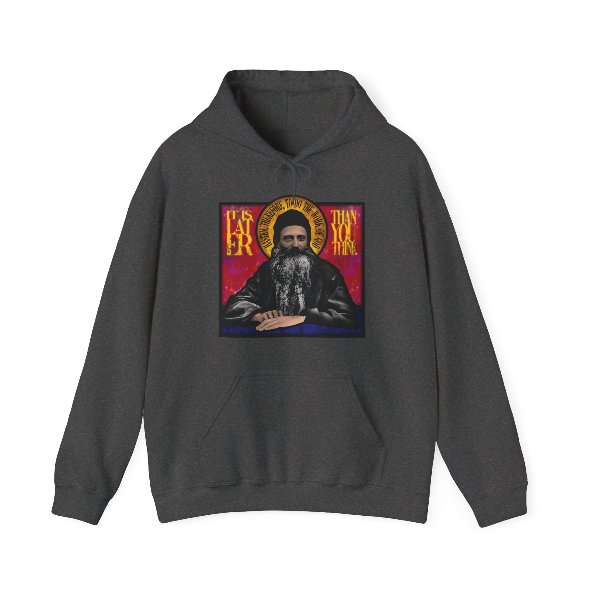 Dark Heather "It Is Later Than You Think" hoodie features a stained glass-style icon graphic and text, honoring Fr. Seraphim Rose, American Orthodox monastic saint—a subtle reference to resurrection and the Kingdom of Heaven.