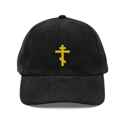 Black cotton corduroy cap with a yellow Orthodox TriBar Cross, symbolizing a weapon of unseen warfare that makes demons tremble, embroidered on the front.
