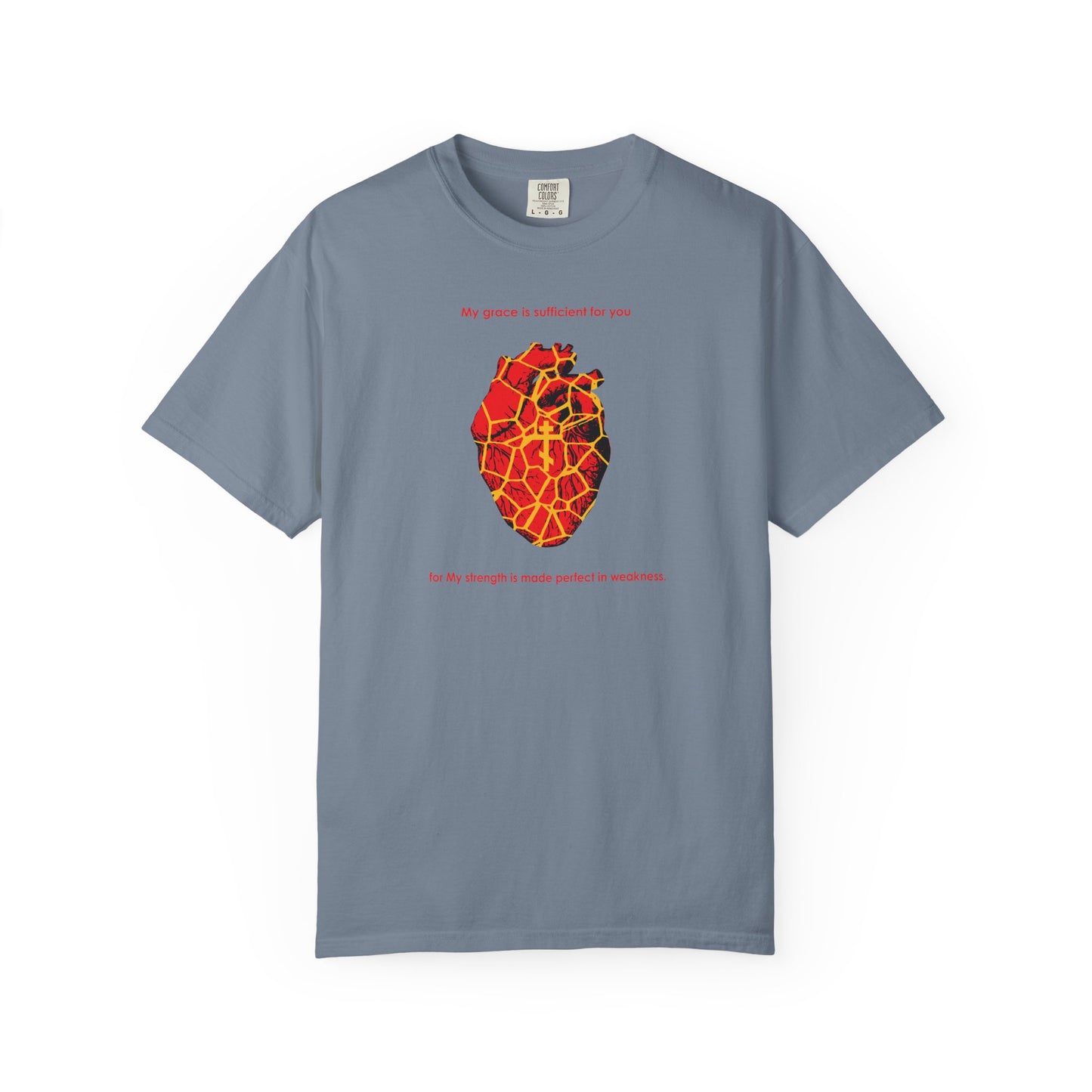 Blue Jean t-shirt featuring a Kintsugi-style golden broken heart with an Orthodox cross, and the message "My Strength is Made Perfect in Weakness (2 Cor 12:9)" displayed above and below the heart design, symbolizing grace and the beauty found in a broken spirit.