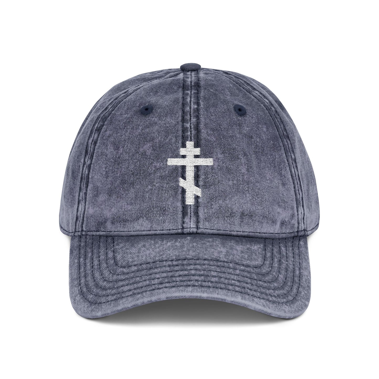 Navy baseball cap with a minimalist white Orthodox TriBar Cross embroidered on the front, symbolizing Christ’s crucifixion. "Crucify My Ego to the Precious and Life Giving Cross"—a simple, distressed Christian statement piece.