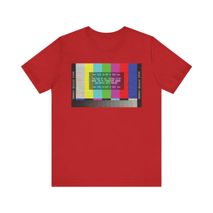 Red "The End of All Things Is At Hand (1 Peter 4:7)" unisex tee featuring a vibrant Emergency Broadcast System TV graphic with color bars and text on the front, delivering an apocalyptic Christian message through its striking design.