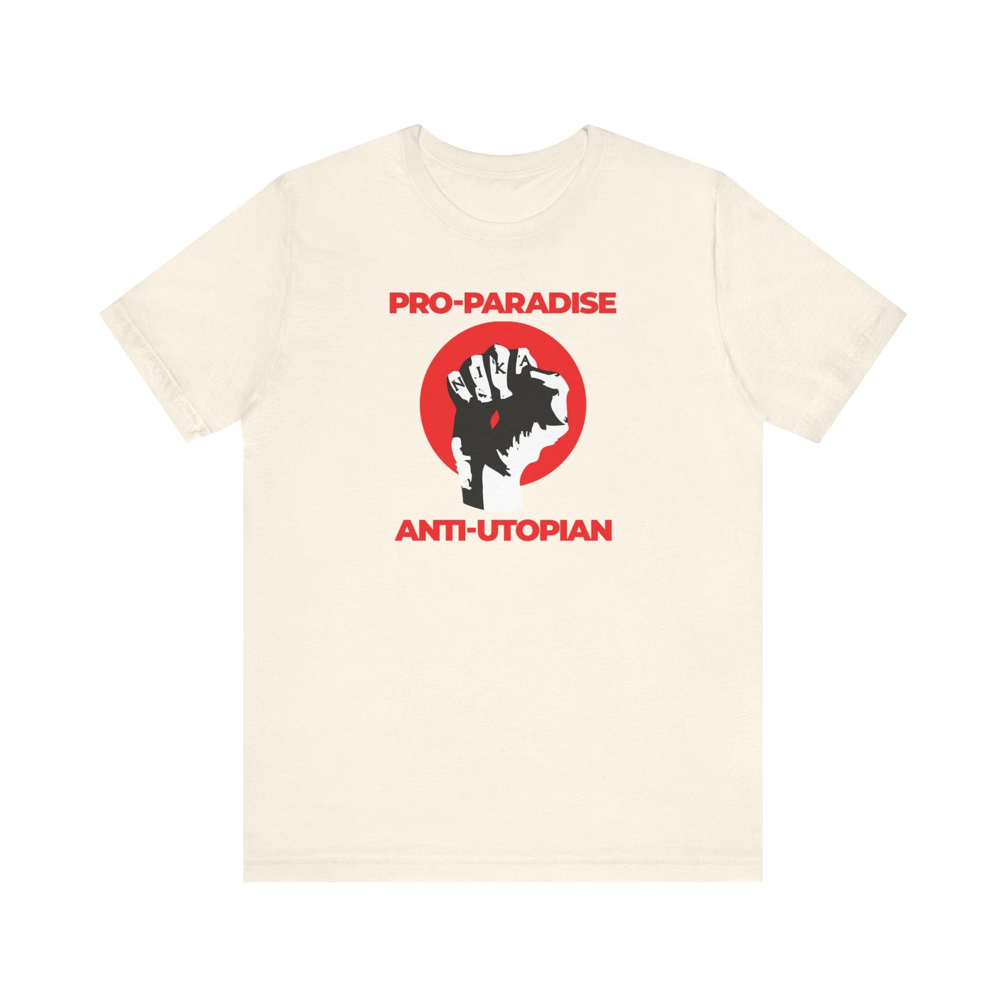 Natural cotton unisex t-shirt featuring the NIKA fist and "Pro-Paradise Anti-Utopian" message—honoring Seraphim Rose’s call to resist the dominant secular paradigm and seek spiritual truth.