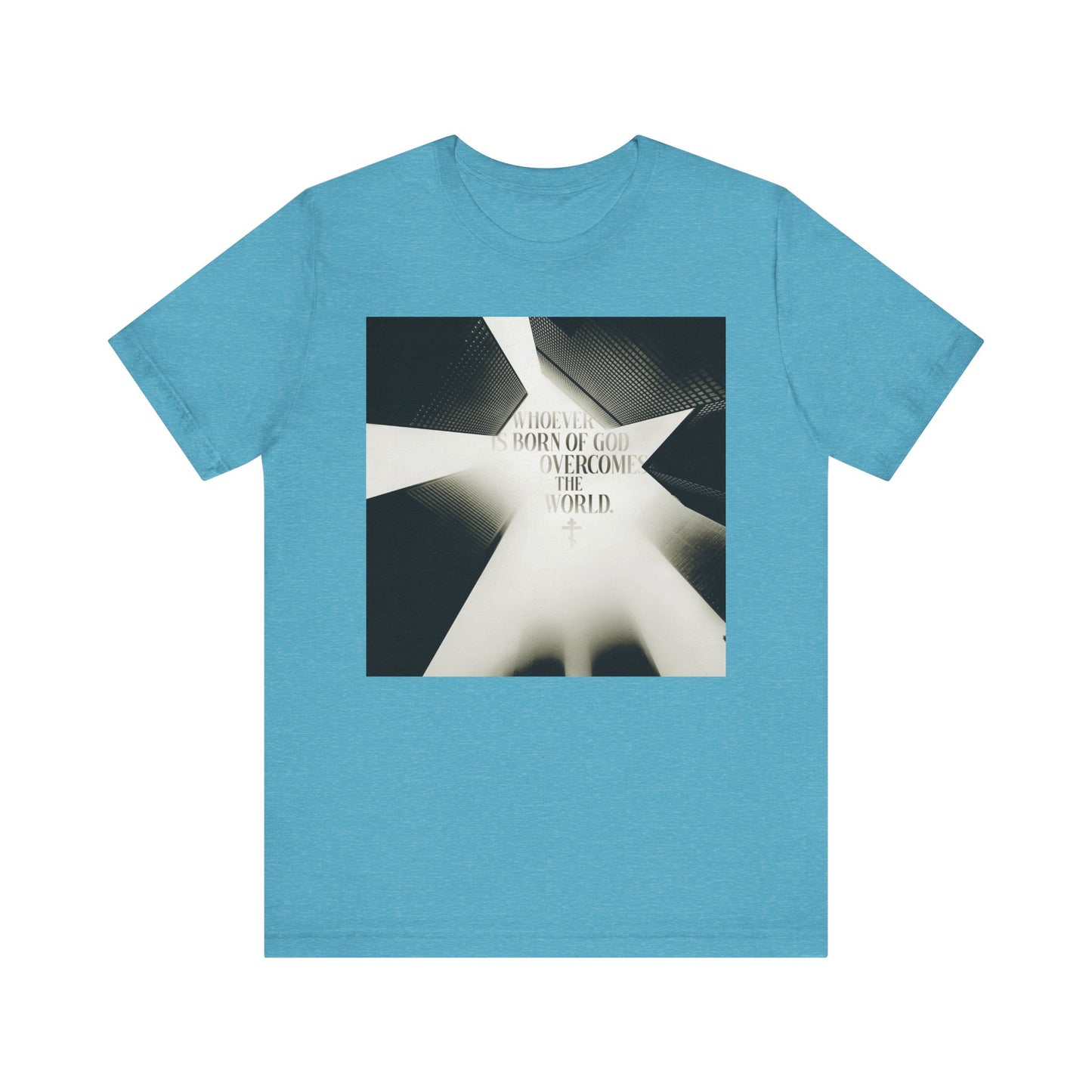 Heather aqua t-shirt featuring a modern cityscape design with religious text, "Whoever is Born of God Overcomes the World" (St John the Theologian), inspired by 1 John 5:1-4, and declaring that Jesus is the Christ. This Orthodox Christian lightweight cotton unisex tee combines contemporary style with a powerful faith statement.