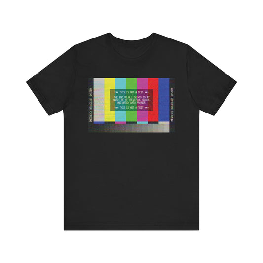 Black "The End of All Things Is At Hand (1 Peter 4:7)" unisex tee featuring an Emergency Broadcast System TV graphic on the front—a lightweight cotton shirt that serves as a bold apocalyptic Christian reminder to approach life with hope and love, even in uncertain times.