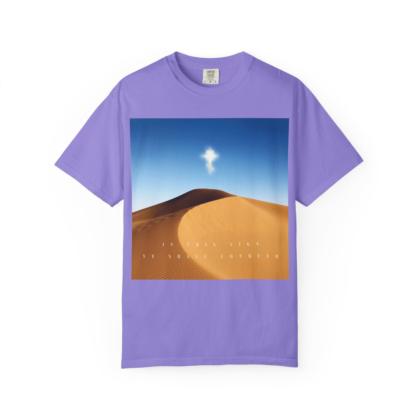 Violet "In This Sign Ye Shall Conquer Desert Sun Scene" Orthodox Christian heavyweight cotton tee featuring a glowing cross rising above desert dunes and the text: In this sign you shall conquer.