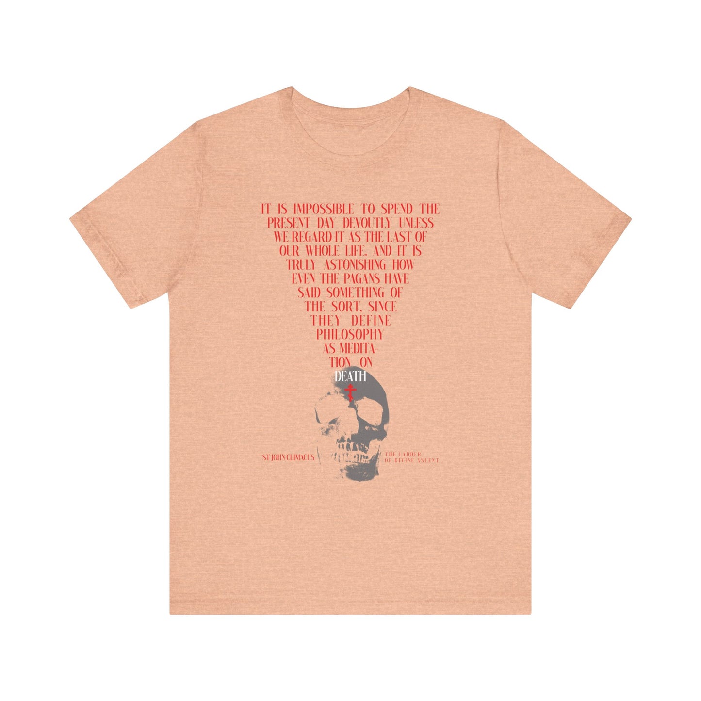 Heather Peach tee featuring St John Climacus’s “The Present Day As the Last Day of Our Life,” with a black skull and red Orthodox cross. A Memento Mori design reflecting on death, made from lightweight cotton for all.