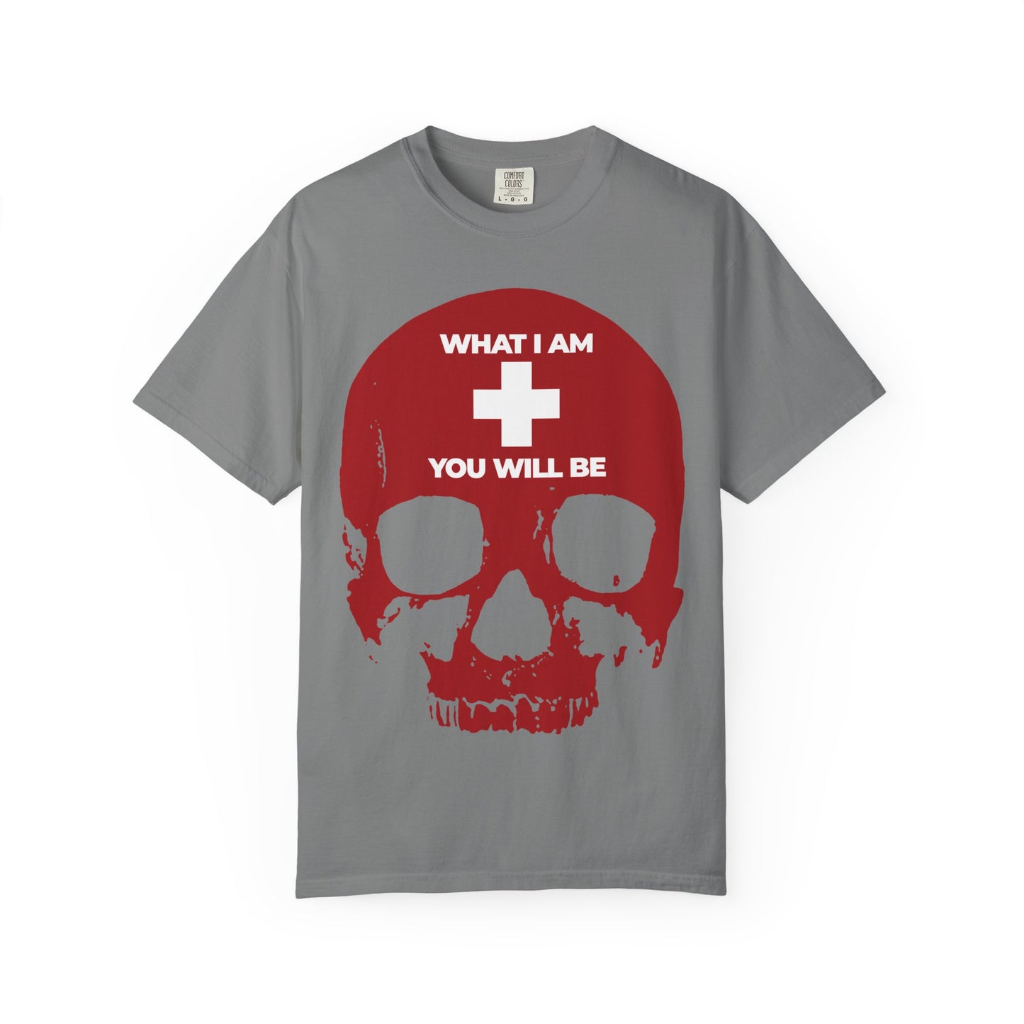 Grey heavyweight cotton unisex tee featuring a bold red skull graphic overlaid with a white cross and the phrase "What I Am You Will Be"—a powerful Orthodox Christian memento mori inspired by Ecclesiastes, designed for thoughtful reflection.