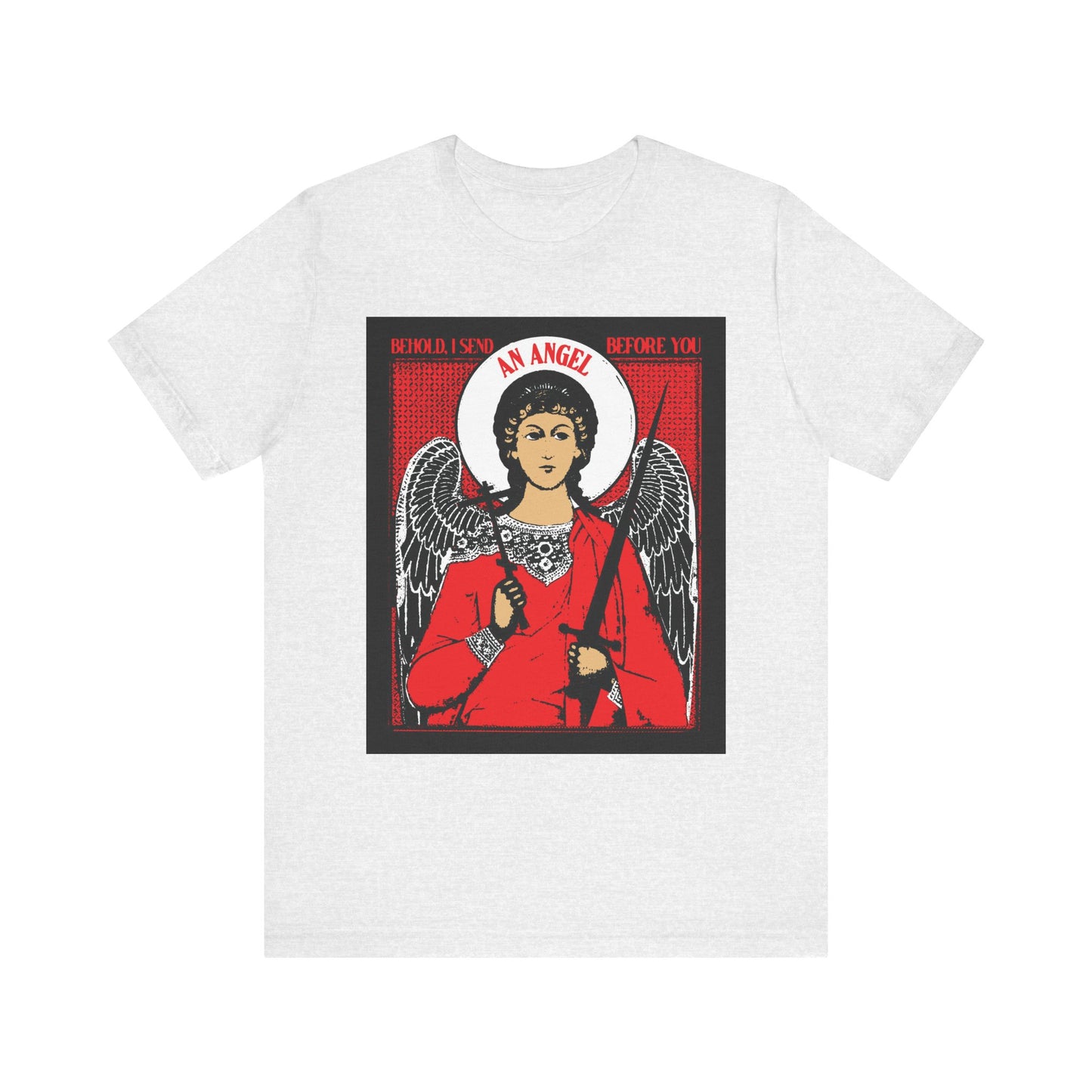 Ash-colored unisex cotton tee features a guardian angel with halo, wings, red robe, cross & sword—offering protection. Text appears above and below artwork. “Behold I Send an Angel Before You (Ex 23:20)” Orthodox IconoGraphic design.