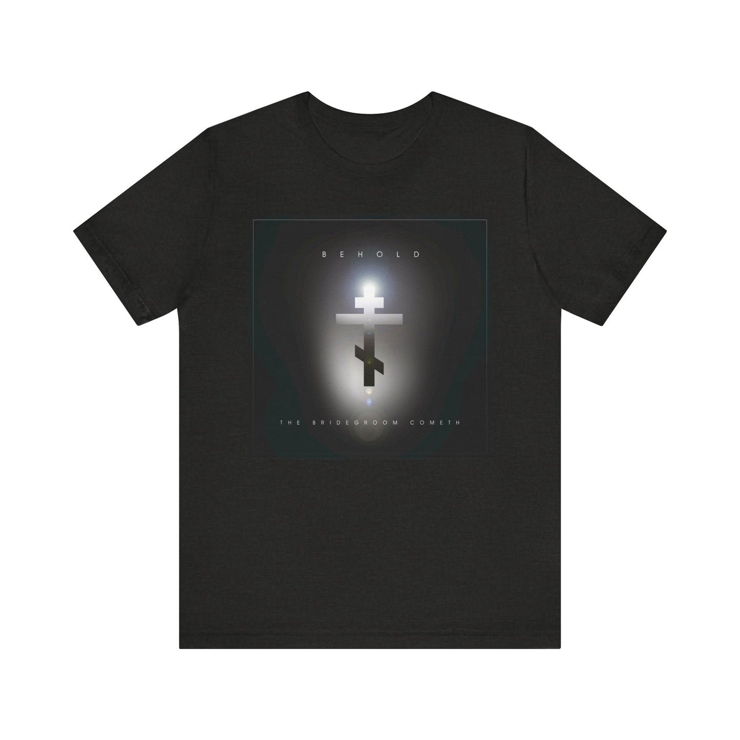 Black Heather unisex t-shirt featuring a minimalist cinematic lens flare Orthodox cross and “BEHOLD THE BRIDEGROOM COMETH” on the front. Lightweight cotton design inspired by Orthodox Christian themes.