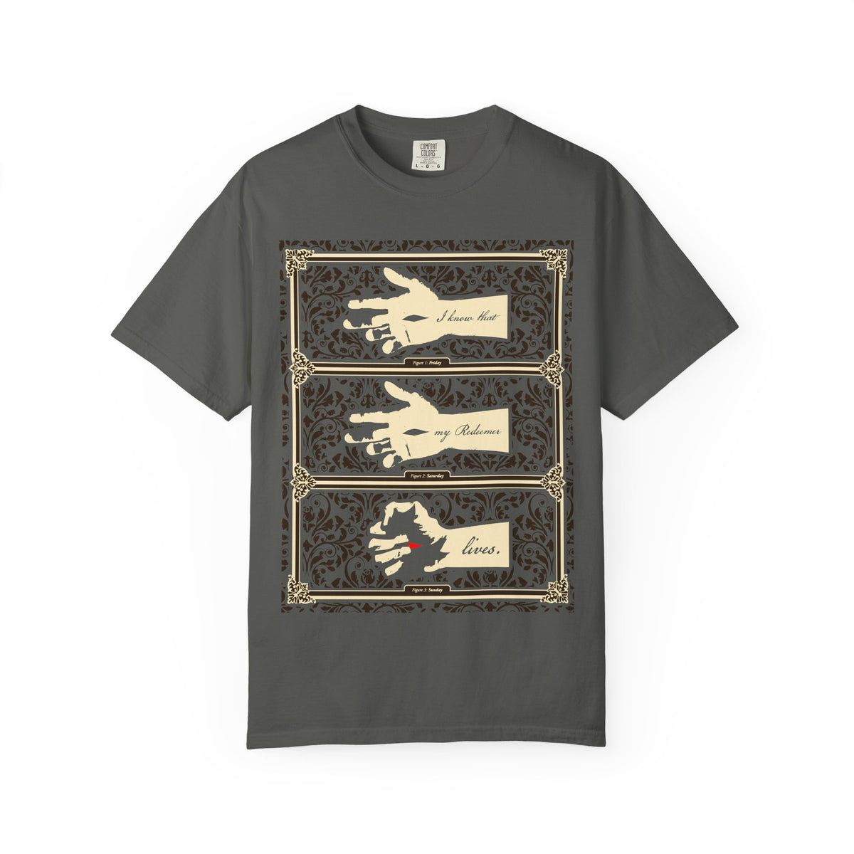 Pepper-colored heavyweight cotton unisex tee featuring three illustrated hands of the Crucified Christ with ornate borders and the text “I Know That My Redeemer Lives” (Job 19:25) in an earthtone Americana style. Inspired by themes of hope and resilience, this design evokes introspection and faith.