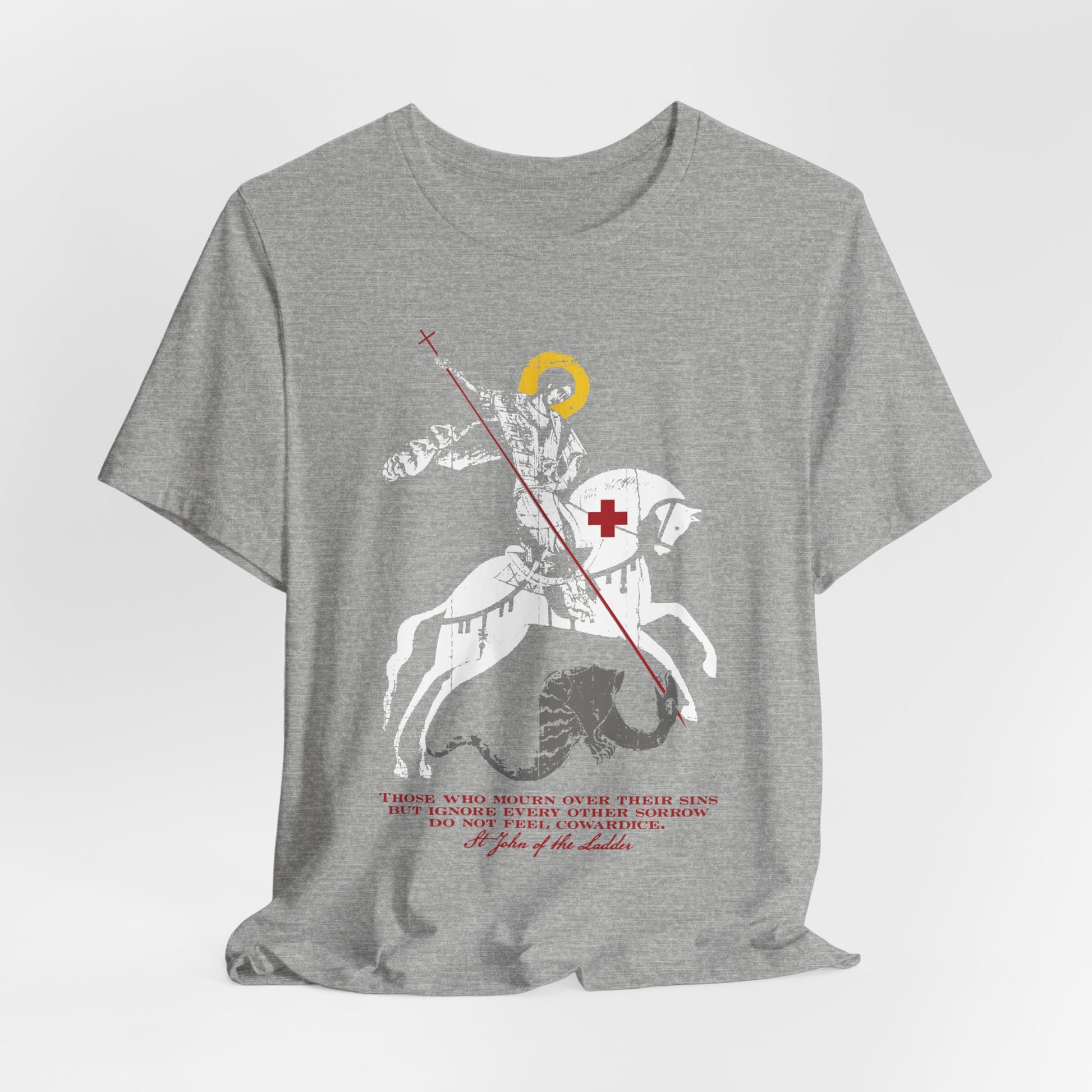 Lightweight cotton unisex tee in gray, featuring an iconographic illustration of St George slaying the dragon, a bold red cross, and text beneath—capturing the Orthodox Christian spirit of St John Climacus and embodying the somber determination described in “Those Who Mourn Over Their Sins.”.