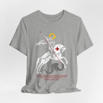 Lightweight cotton unisex tee in gray, featuring an iconographic illustration of St George slaying the dragon, a bold red cross, and text beneath—capturing the Orthodox Christian spirit of St John Climacus and embodying the somber determination described in “Those Who Mourn Over Their Sins.”.