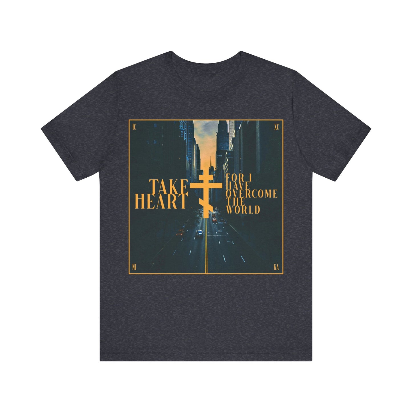 Heather Navy cotton t-shirt featuring a modern city street scene and gold cross, with the message: Take Heart, For I Have Overcome the World (John 16:33). Orthodox Christian design turns sorrow into joy.