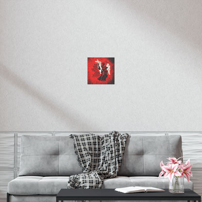 A "Little Divides Angels from Men | Christian Perfection" art poster by St John Chrysostom hangs above a gray sofa adorned with a plaid blanket, flowers, and an open book, inspiring visitors with its Orthodox Christian message.