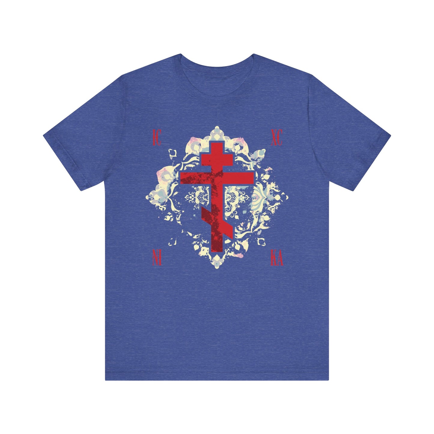 Heather True Royal unisex cotton tee featuring a textured red Orthodox cross with medieval floral background and "ICXC NIKA | Jesus Christ Conquers"—a tribute to steadfast faith amid suffering.