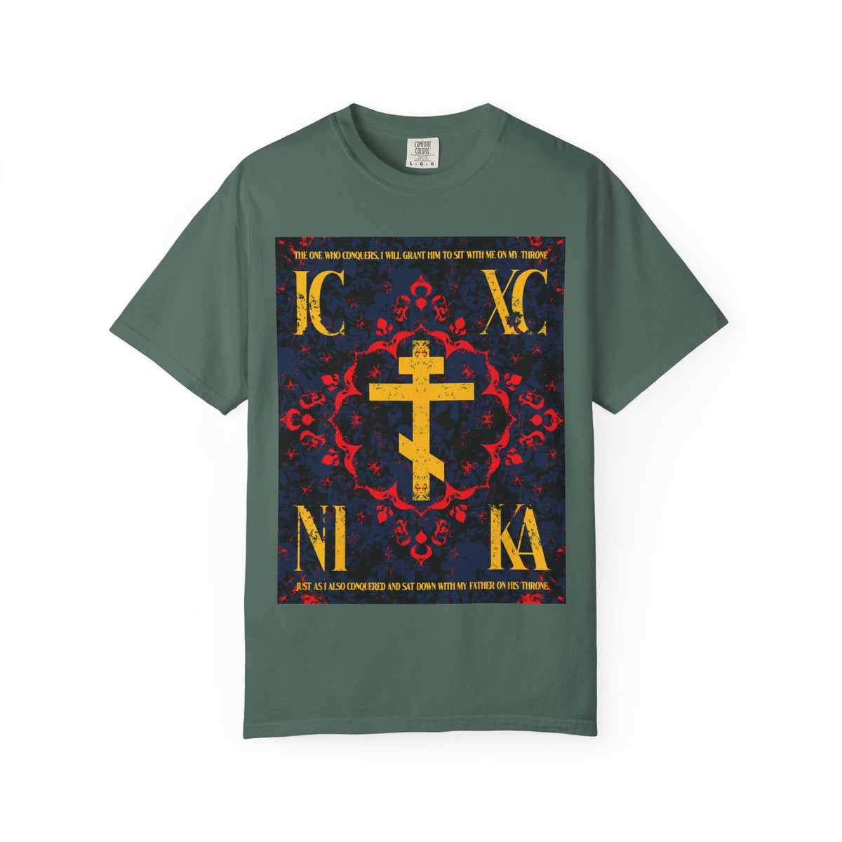 Blue Spruce “IC XC NIKA Orthodox Cross” heavyweight cotton unisex T-shirt featuring a medieval floral design with a gold Eastern Orthodox cross and red decorative border at the center of the chest, symbolizing both the grace of God and personal effort on the path to salvation; inspired by “The One Who Conquers” (Revelation 3:21).