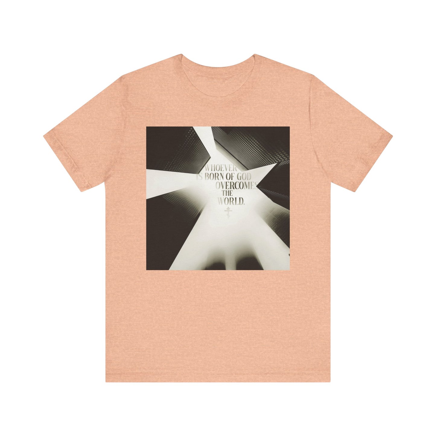 Heather peach t-shirt featuring a modern cityscape and text inspired by 1 John 5:1-4: "Whoever is Born of God Overcomes the World"—an Orthodox Christian lightweight cotton unisex tee.