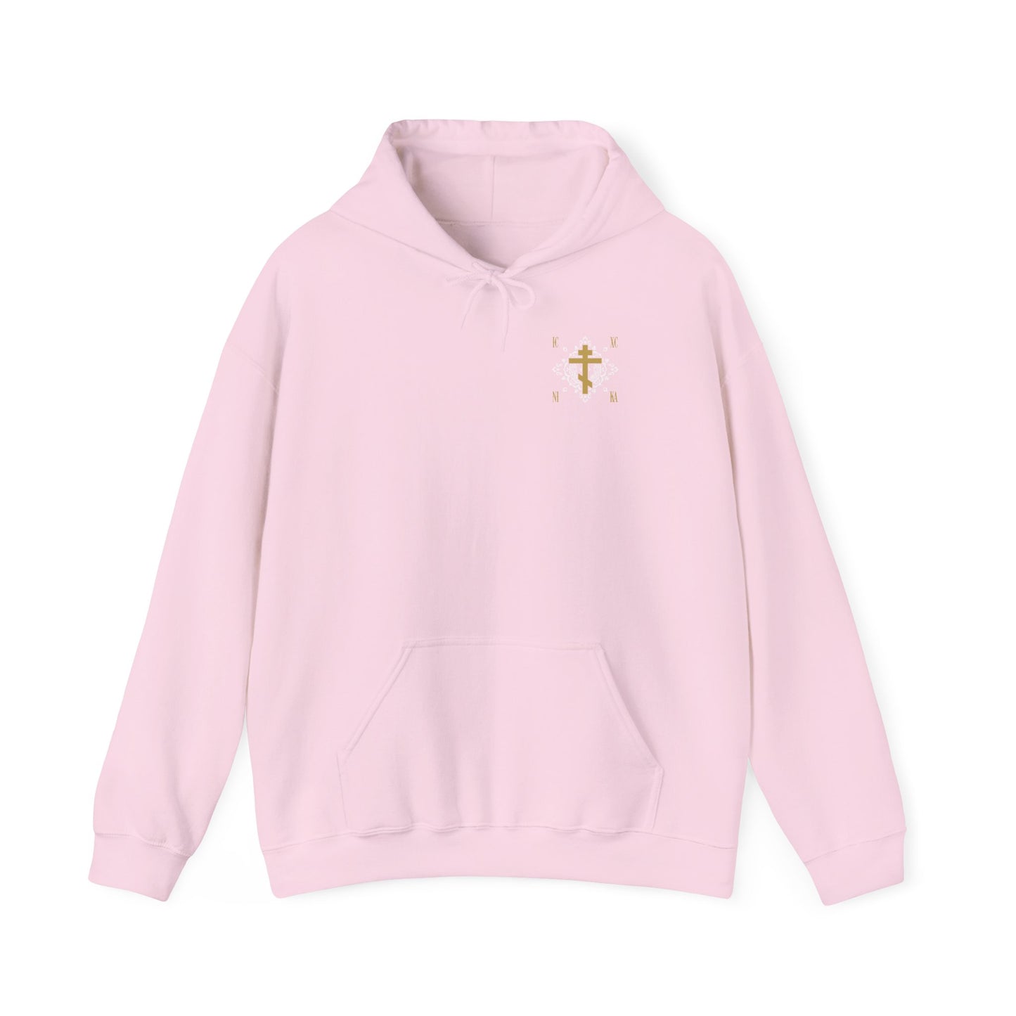 Light pink hoodie featuring a small gold Orthodox Cross ICXC NIKA design on the left chest, accented with a white medieval ornate floral pattern and “Jesus Christ Conquers” motif. Displayed on a white background, this Christian hoodie offers a subtle reminder of faith and eternal life.