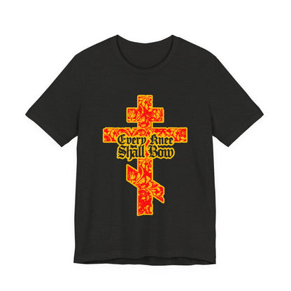Black unisex tee featuring a gold and red floral Orthodox cross with gothic "Every Knee Shall Bow" text, inspired by Isaiah 45:22-24 and Philippians 2:7-11, celebrating the righteousness of Jesus Christ.