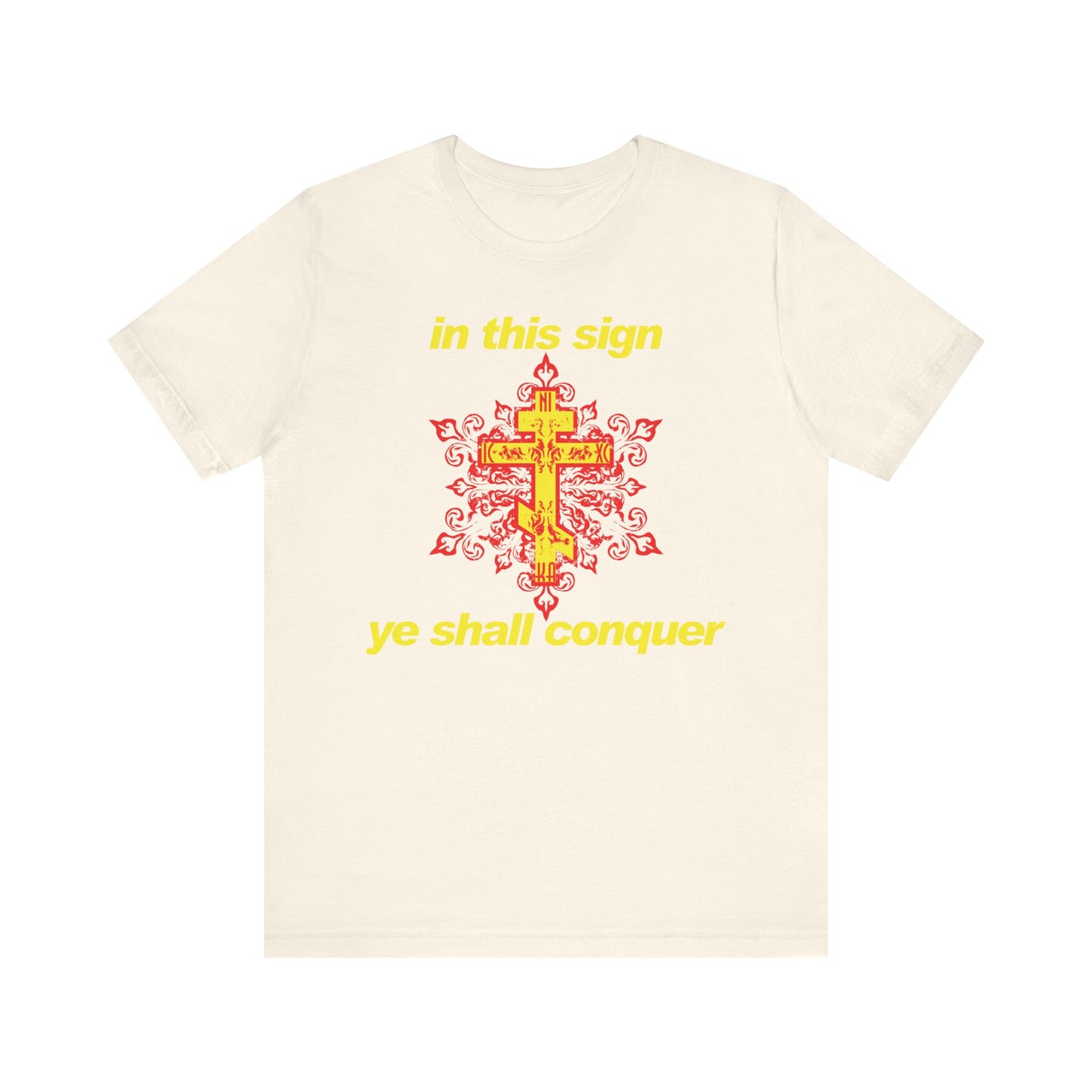Natural-colored t-shirt featuring a modern red and yellow cross design and bold yellow text: "In This Sign Ye Shall Conquer"—a unique Orthodox Christian lightweight cotton unisex tee inspired by St Theophan the Recluse’s wisdom on overcoming temptation through spiritual strength.