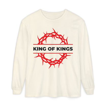 Ivory long-sleeve shirt featuring a red crown of thorns and "KING OF KINGS" text, inspired by Revelation 19:16. King of Kings Crown of Thorns | The King of Glory | Christ is King Christian cotton shirt.