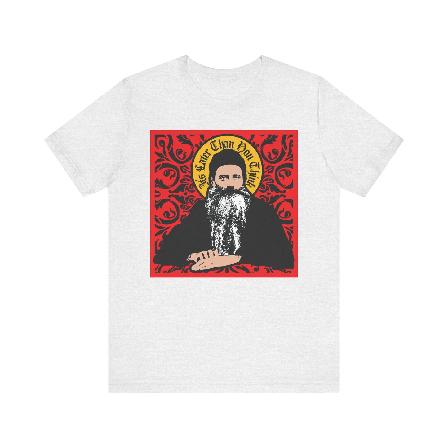 Ash t-shirt with a red ornate design featuring Saint Seraphim Rose of Platina in an icono-graphic style and text “It’s Later Than You Think.” Lightweight cotton unisex tee—ideal for Orthodox Christians.