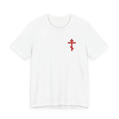 White cotton unisex t-shirt featuring a small red embroidered Orthodox cross, inspired by Galatians 6:14, on the left chest. "May I Never Boast Except in the Cross.