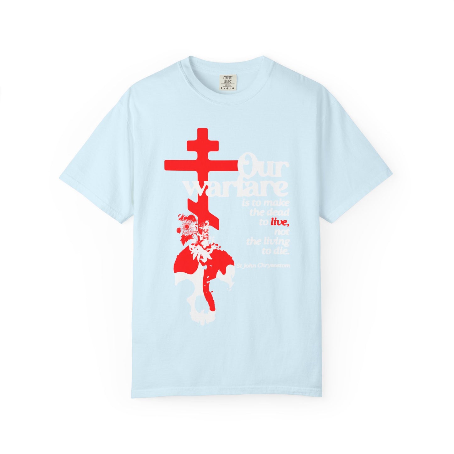 Chambray heavyweight cotton unisex tee featuring an Orthodox cross, flowers, and skull design in the center with white and red text, inspired by St. John Chrysostom’s teachings on Christian power—titled “Our Warfare is the Make the Dead to Live.”.