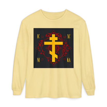 Butter-colored long-sleeve shirt featuring a gold Russian Cross and "ICXC NIKA" on an ornate red background. Orthodox Christian design celebrates Jesus Christ Conquers.