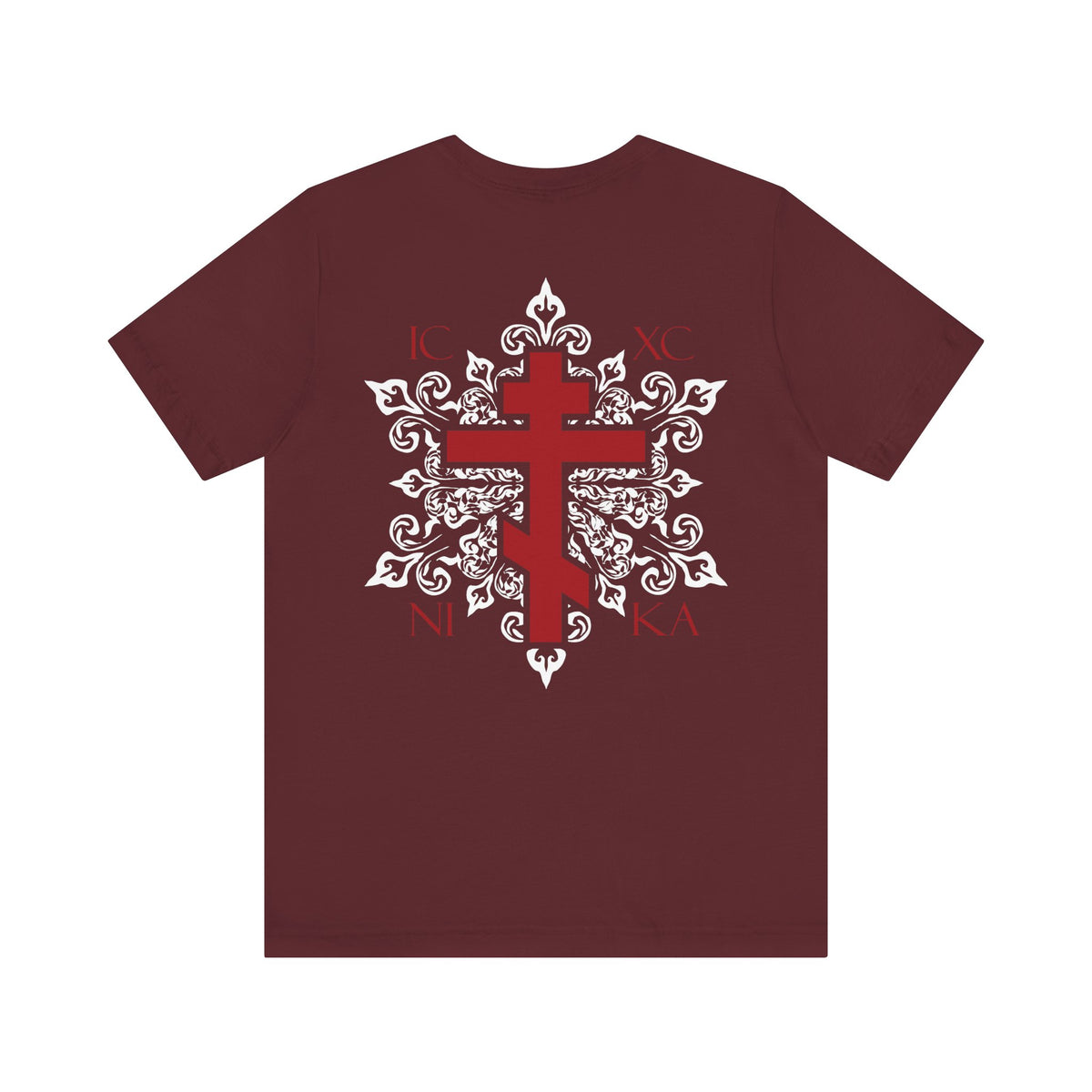 Custom order maroon lightweight cotton unisex t-shirt featuring a red Orthodox cross on the front left breast and an ornate white medieval floral ICXC NIKA cross design with Greek letters in white and red on the back.