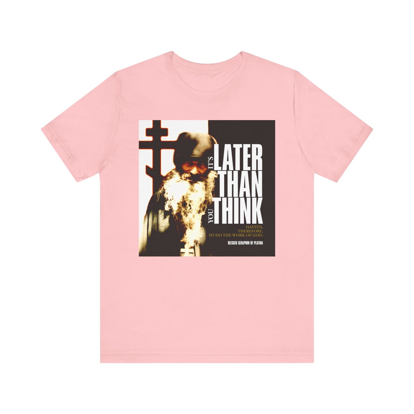 Pink “It’s Later Than You Think” unisex t-shirt features St Seraphim Rose’s photo with modern cinematic poster typography. Lightweight cotton, Orthodox-inspired design.