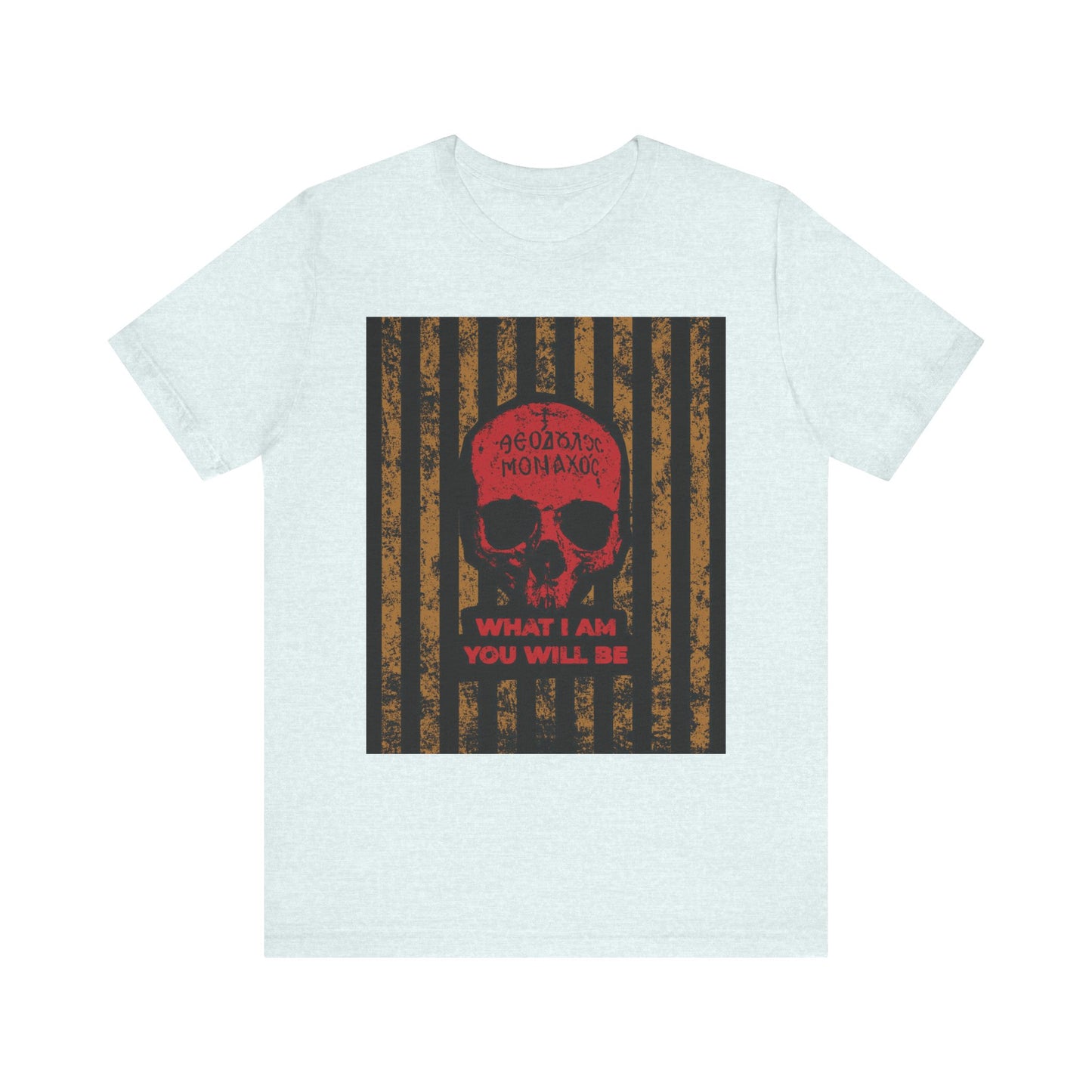 Heather ice blue lightweight cotton unisex t-shirt featuring black and brown stripes, a red Mt Athos monk skull graphic, and the text: What I am, you will be—an evocative memento mori inspired by St. Ignatius Brianchaninov’s teachings on spiritual death from the Ascetic Ethos collection.