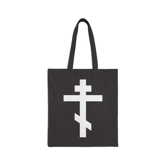 Black tote bag featuring a large white Orthodox cross and the quote "May I never boast, except in the cross of our Lord Jesus Christ" (Gal 6:14), symbolizing faith and salvation.