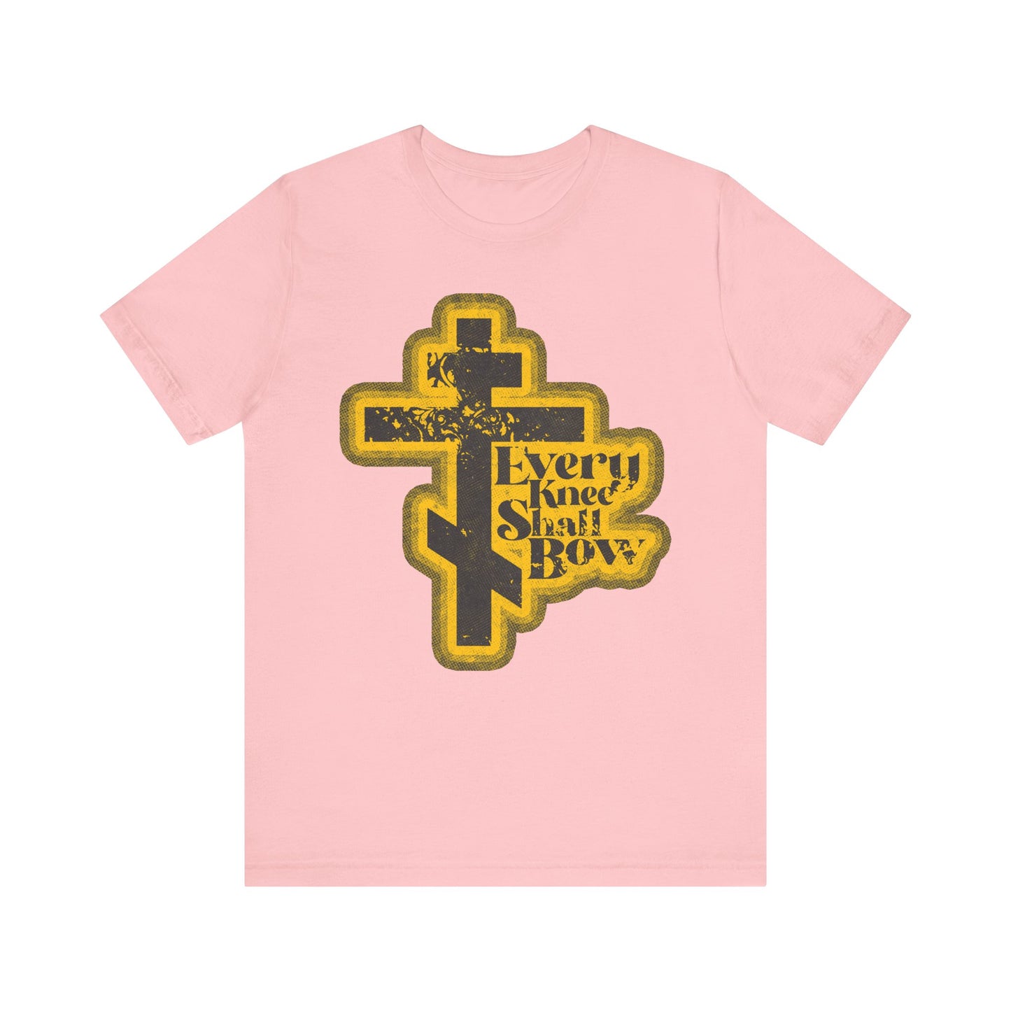 Pink lightweight cotton unisex tee featuring a 70s distressed halftone yellow Orthodox cross and "Every Knee Shall Bow" text, inspired by Philippians 2:10-11 and Isaiah 45:23. Comic book aesthetic design.