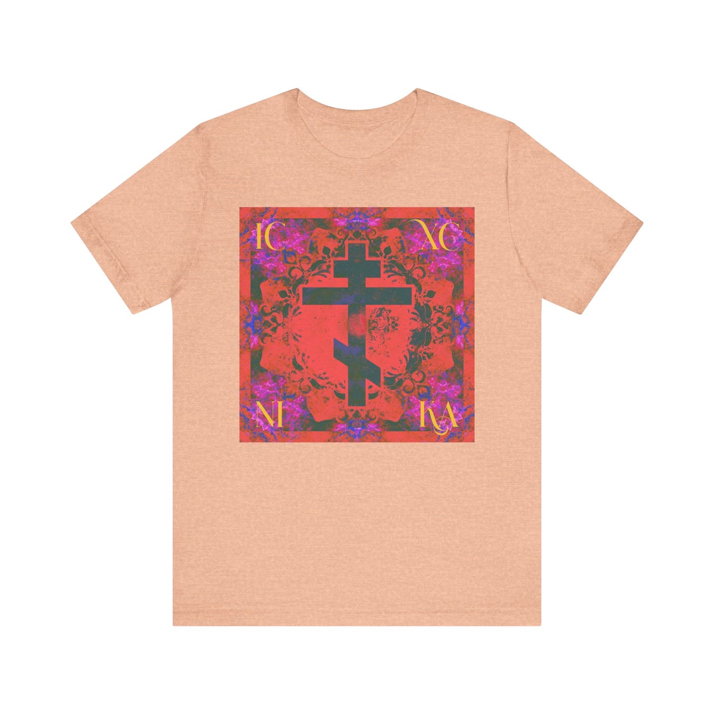 Heather peach ICXC NIKA Colorful Orange Magenta Cross Orthodox Christian lightweight cotton unisex tee, featuring a vibrant red square graphic with a black cross inspired by St. John of Kronstadt, and accented with purple floral designs.